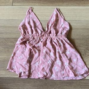 Blush pink crop top with flowers on it never worn